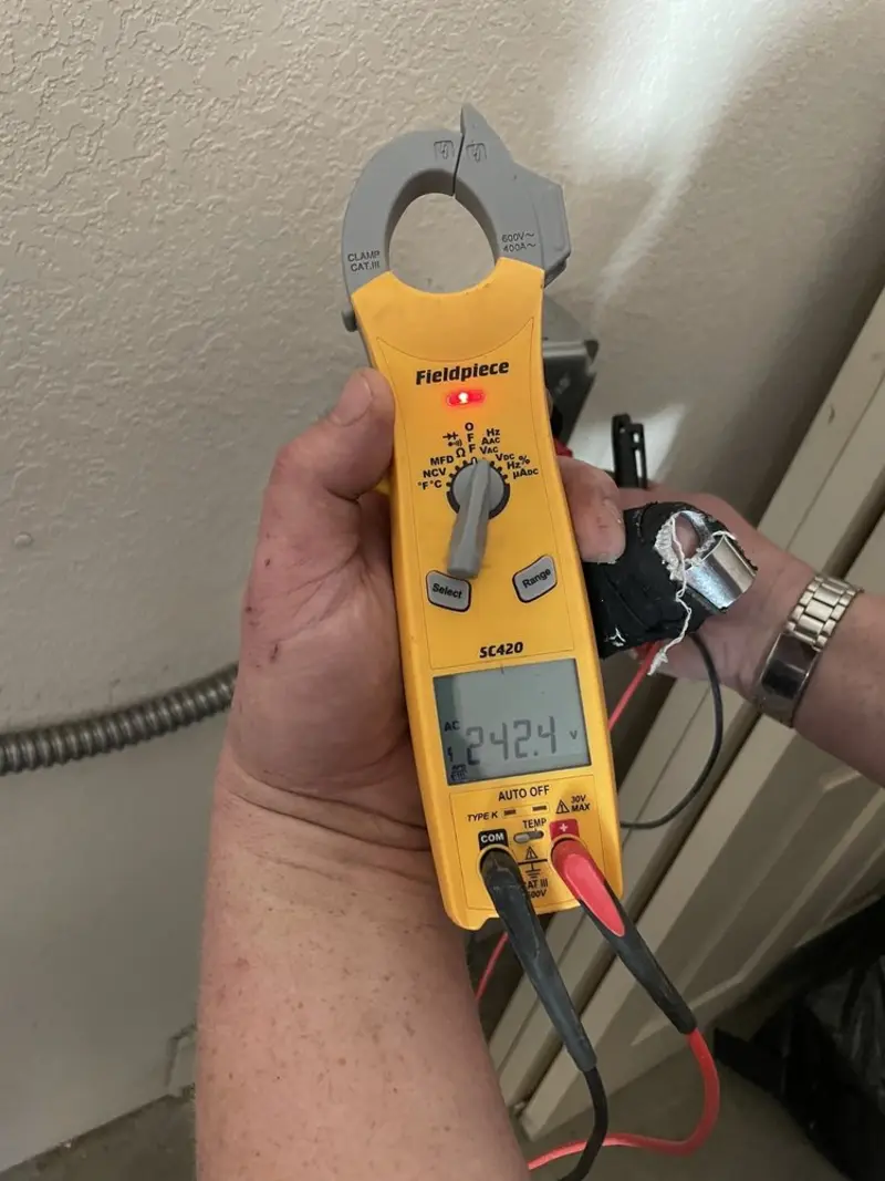 Voltage testing with clamp meter during Electrical Installation Services in Guerneville